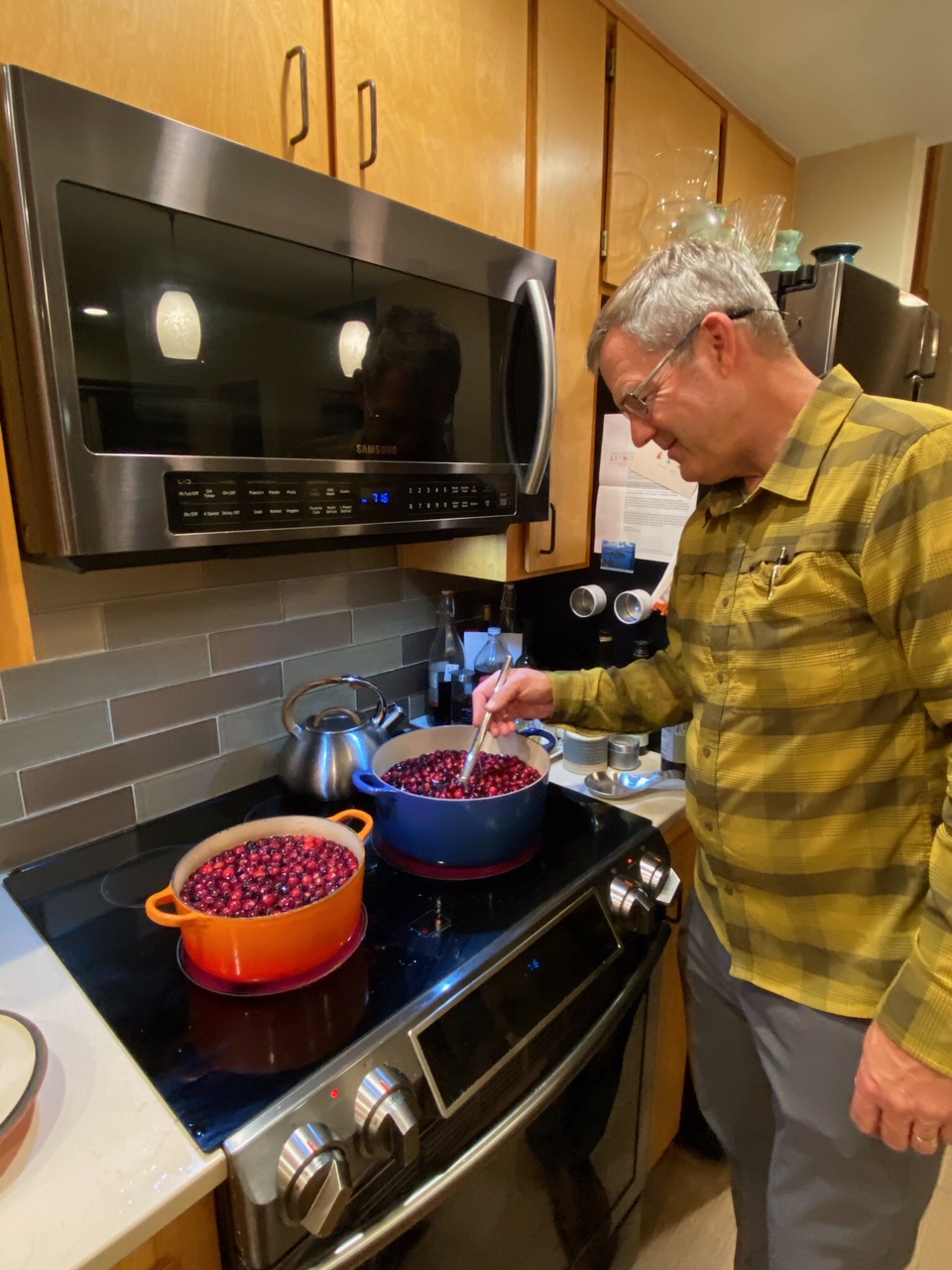 doug lethin stirring cranberries in a nice remodeled kitchen doug lethin stirring cranberries in a nice remodeled kitchen