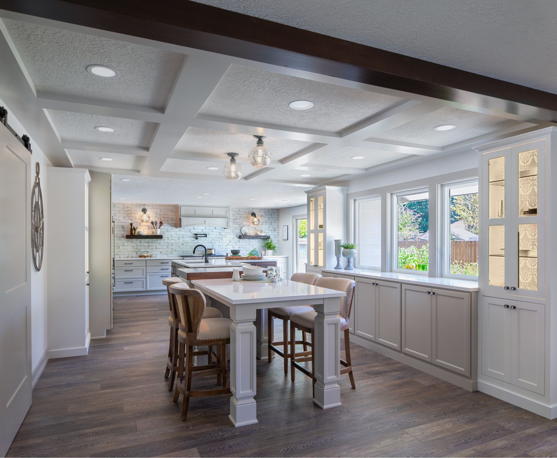 C&R redesigned and remodeled this 70’s kitchen with newcabinets, counter tops, tile backsplash, appliances, and more.